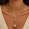 Cadena de Perlas Oceánicas de Venta Caliente Transfronteriza Europea y Americana Cadena para Clavícula de Mujer Colgante de Estrella de Mar y Concha Collar Multicapa Apilable Venta al por Mayor