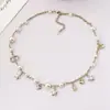 Colar com Pingente de Estrela e Franja Xiaoxiang Estilo Novo com Diamantes e Pérolas, Corrente Popular para Clavícula Feminina, Colar de Suéter de Luxo Leve com Letra