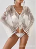 Cubierta de playa de manga larga con calados de corte europeo y americano Exportación de tops Transfronteriza Sexy Casual Primavera y Verano 2025 Nuevo Cordón Cuello en V