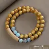 Pulseira de contas de oração budista de madeira crua natural, vendida a quente, sândalo dourado, sândalo Barbie, pulseira colecionável para homens e mulheres, fornecimento para live-stream