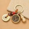 Llavero de latón Wu, dios de la riqueza, transferencia de dinero, cobre puro, cinco emperadores, dios de la riqueza, llave de transferencia, colgante, venta al por mayor, lugar escénico, pequeño regalo