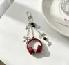 Chiyu Original Fone de Ouvido Musical Estilo NS Corrente para Celular Pingente para Mochila Personalizado Chaveiro de Nota Musical Pingente Criativo Venda por Atacado