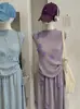 Conjunto de Dos Piezas Omalai: Chaleco de Punto sin Mangas con Flores Tridimensionales y Falda Larga Nueva Colección Primavera/Verano 7007