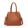 Bolso de Mano de Cuero Suave Más Vendido en Comercio Exterior para Mujer Modelo Nuevo 2026 Bolso de Hombro Cruzado de Tres Capas de Gran Capacidad Simple y Elegante