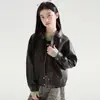 Chaqueta de cuero estilo coreano para niña, nuevo modelo otoño 2026, abrigo holgado retro con cuello de solapa para niños, moderno