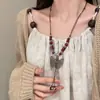 Nuevo Estilo Chino Retro Estilo Étnico Estilo Antiguo Mariposa Cerámica Collar Mujeres Nicho Lujo Ligero Cadena Larga para Suéter