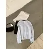 IMISS 2026 Otoño Estilo Coreano Suave Temperamento Reductor de Edad Un Hombro Dos Vías Manga Larga Suéter Cálido S991553