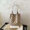Bolso de gamuza para mujer 2026 nuevo otoño Maillard retro lunares bolso de mano para el día a día bolso de hombro de gran capacidad