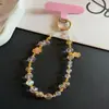Pulseira de Cristal Gato da Sorte Tira de Celular Estilo Ins Ornamento de Pulso de Alta Qualidade Capa de Celular Artesanal Tira de Pulso