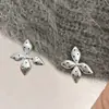 Aretes negros de lunares estilo coreano, con diseños de moño y florales, aretes de aro en forma de C, un estilo fresco y simple, disponibles en múltiples diseños