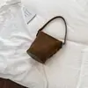 Bolsa feminina de axila 2026 nova outono vintage camurça Melard bolsa de ombro crossbody balde bolsa de celular