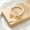 Banhado a ouro, forte retenção de cor, corrente de extensão em forma de coração com zircônia incrustada, acessórios para pulseira e colar de pérolas DIY