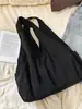 Bolsa de tela ligera casual de gran capacidad transfronteriza para mujer, nuevo bolso versátil simple para el hombro o debajo del brazo 2025, bolsa de mano para el trabajo