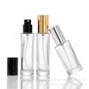 Botella de perfume de vidrio transparente de 15 ml y 18 ml, venta al por mayor, disponible en stock, envase de perfume, botella vacía, botella de muestra en aerosol portátil.
