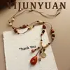 Collar Retro de Moda Estilo Étnico con Borla y Piedra Ojo de Tigre, Cadena Versátil de Suéter de Lujo Ligero de Nicho de Alta Gama para Mujer
