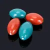 Accesorios para equipo de pesca al por mayor colgante de plomo con forma de oliva Caña de roca Caña de lanzar al mar Cuerda de lanzamiento largo anzuelo colgante de pez núcleo de plástico de color colgante de plomo de oliva