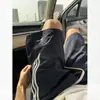 Pantalones cortos bordados de rayas rosas de secado rápido para hombre, pantalones cortos finos de seda de hielo para verano, pantalones casuales rectos de longitud media