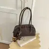 Bolso de mano tejido retro transfronterizo, nueva colección 2026 para mujer, diseño de alta gama, gran capacidad, adecuado para ir al trabajo, bolso de hombro, y se puede llevar bajo el brazo