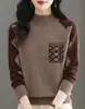 Tejido de punto de cuello alto medio para mujer 2025 Nuevo estilo de invierno Jacquard Holgado Corto Camiseta interior de punto Moderna