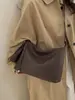 Bolsas Retro Melanoides para Mujer 2026 Nuevo Pequeño Nicho Gran Capacidad Bolso de Mano para Viajes Diarios Bolso Cruzado de Hombro Único Simple