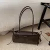 Bolsa Pequena Retro Texturizada de Luxo para Mulheres 2025 Novo Modelo Versátil Bolsa de Ombro para o Dia a Dia Bolsa de Mão Fashion Bolsa Baguette