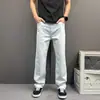Jeans rectos de alta gama con textura para hombre, nuevo estilo de otoño, corte holgado, adelgazantes, versátiles para ir al trabajo, pantalones de pierna ancha estrecha