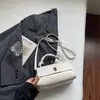 Bolsa de Mão Prata para Mulheres, Novo Modelo Tendência Primavera 2026, Nicho e Super Popular, Pequena Bolsa Tote para Escritório com Acabamento de Luxo, Bolsa de Ombro Cruzada