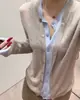 Top de punto único de dos piezas con bloques de color, ajuste ceñido, manga larga, chaqueta cárdigan fina de cuello redondo para mujer, principios de otoño 2026