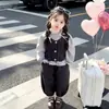 Conjunto de primavera para niñas 2026 nuevo estilo conjunto coreano chic moderno genial conjunto de tres piezas de primavera para niñas pequeñas