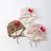 Bonito gorro de orejeras Hello Kitty estilo coreano, gorro cálido con forro de felpa, con cordones para evitar que se caiga, gorro para niños
