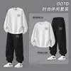 Traje casual de dos piezas para hombre transfronterizo estilo Hong Kong, con estampado de letras simple, moderno y elegante, cuello redondo, versátil, corte holgado