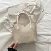 Bolsa de mão retrô popular de vários anos para mulheres, versátil para o outono, novo estilo 2026, bolsa de ombro único e transversal, bolsa tipo saco