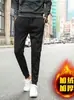Calça masculina para esportes de inverno transfronteiriça, roupa de trabalho juvenil, calça casual estudantil com forro de fleece, tendência versátil para outono e inverno