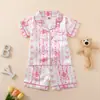 Conjunto de Pijama Infantil Verão Estampa de Laços Roupas de Casa para Meninas Peça Dupla Roupa Infantil Manga Curta Gola Reversível