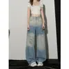 Calça Jeans Patchwork Rasgada Estilo Americano para Mulheres, Tendência Versátil Verão 2026 Nova Calça de Cintura Alta Fluida Comprimento Total