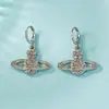 Pendientes de Planeta Saturno Incrustados de Diamantes de Nuevo Estilo Transfronterizos Europeos y Americanos, Diseño Elegante y Sofisticado, Joyería de Gama Alta al por Mayor, Brillantes