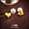 Pendientes Geométricos Cepillados Dorados de Nicho Pendientes de Lujo Accesible Europeos y Americanos Pendientes de Corazón Simples de Gama Alta Moda Femenina Pendientes Versátiles