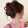 Elegante pinza de garra retro versátil, pinza de tiburón floral de lujo ligero primavera/verano, nuevo accesorio para el cabello de pinza de garra dulce y simple 2026