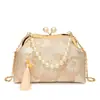 Bolsa com Fivela de Linha Bordada Estilo Étnico para Mulheres Nova Coleção Verão 2025 Bolsa de Mão com Corrente de Contas Bolsa de Ombro Transversal Casual