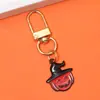 Llavero colgante de metal para Halloween transfronterizo europeo y americano, decoración de calabaza, calavera, gato fantasma para bolsos de mujer