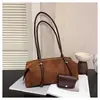Bolso tipo almohada de gamuza retro de nicho para mujer, nuevo bolso de hombro para el día a día 2026, bolso versátil y elegante para el antebrazo
