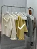 Dulce y elegante conjunto de punto, nuevo modelo otoño/invierno 2026, conjunto de dos piezas de suéter floral tridimensional + falda para mujer