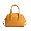 Bolsa de mão com textura de tendência transfronteiriça bolsa quadrada pequena bolsa feminina verão 2026 nova bolsa de ombro única trançada bolsa transversal para trabalho