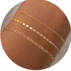 Pulsera Cruzada Europea y Americana de Perlas Doradas Nueva Pulsera de Perlas Redondas con Electrochapado de Cobre 14K Pulsera Elástica de Perlas Hecha a Mano Venta al por Mayor
