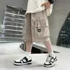 Roupas Infantis Meninos Shorts Casuais de Verão 2026 Novo Estilo para Meninos Mais Velhos Shorts Cargo Versátil Solto Tendência