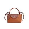 2026 Nova Bolsa Mini Bolinho Color Block de Nylon Mais Vendida para Mulheres, Versátil para o Dia a Dia, Sensação de Luxo, Bolsa de Mão e Bolsa Transversal para Celular
