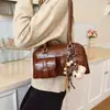 Bolso Casual Retro Popular Transfronterizo para Mujer 2025 Nuevo Más Vendido Bolso de Hombro de Gran Capacidad Bolso Versátil de Axila