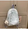 Mochila Simples de Cor Sólida para Uso Externo Design Feminino Nicho Leve Mochila Escolar Pequena para Alunos do Ensino Fundamental e Médio Mochila Pequena Feminina