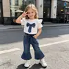 2026 Nuevo Conjunto de Estilo Academia para Niñas de Comercio Exterior Transfronterizo Top Blanco de Mezclilla con Lazo Manga Corta + Pantalones Largos
