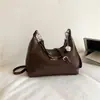 Bolsa Pequena Acolchoada com Corrente Estilo Chanel para Axila Nova Coleção Outono 2026 Elegante Bolsa Hobo Versátil para o Dia a Dia Bolsa Transversal para Mulheres